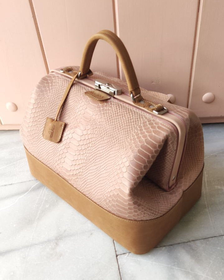 Designer doctor's bag with a textured surface on a light background