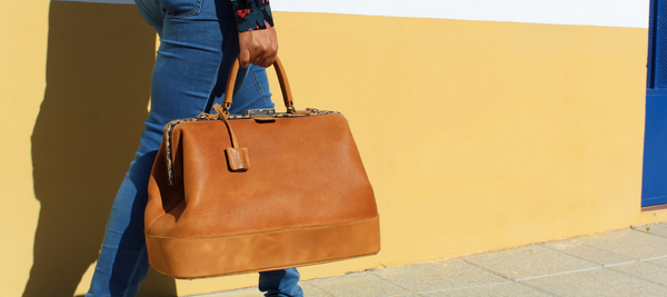 This leather laptop bag for women is handmade
